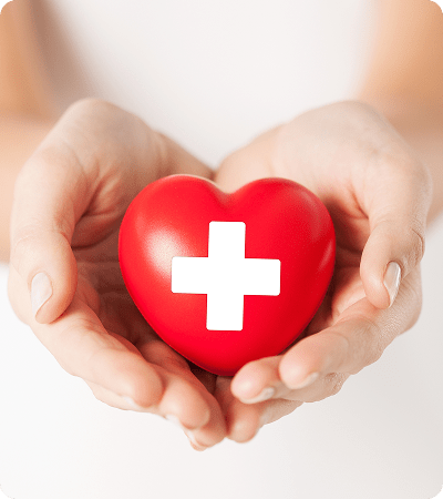 family-health-charity-medicine-concept-female-hands-holding-red-heart-with-cross-sign 1
